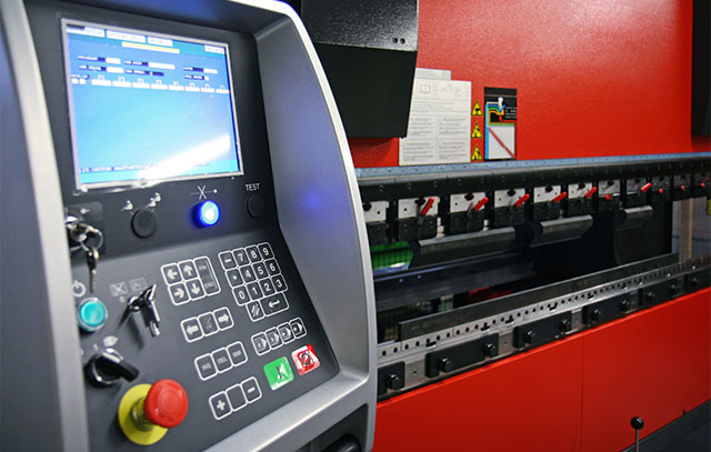A control panel of a CNC press brake